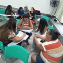 Participantes engajados nas atividades da oficina sobre Modelos de Negócios.